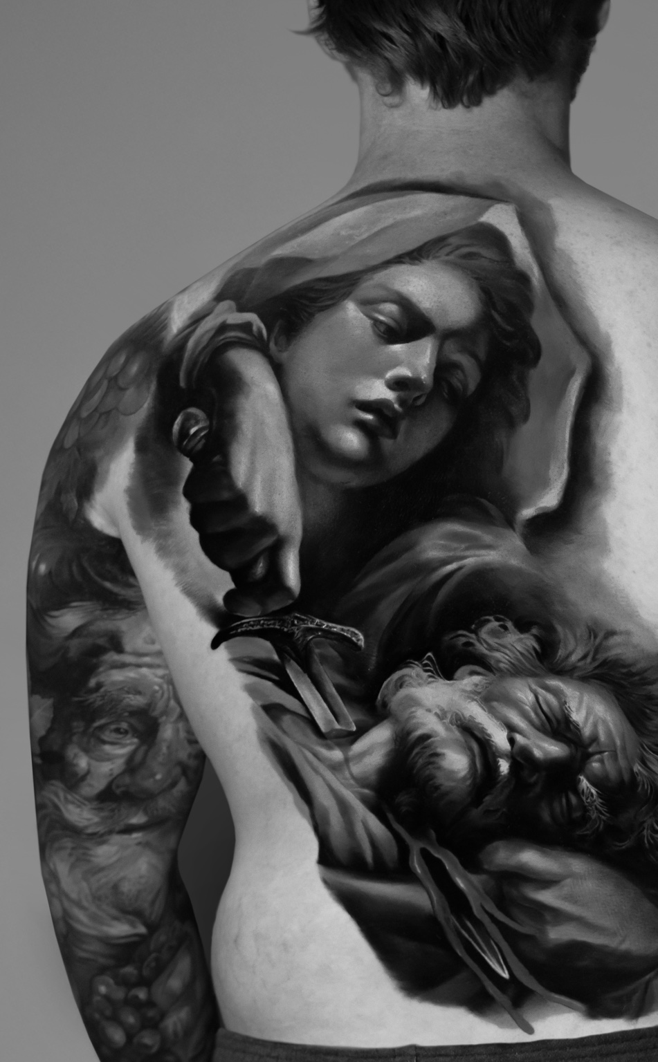 Fine-art back piece tattoo by Tony Vilella
